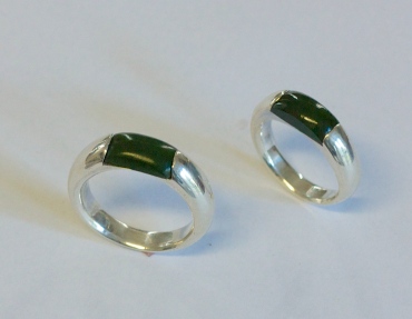 Two wedding rings: silver, ponamu.